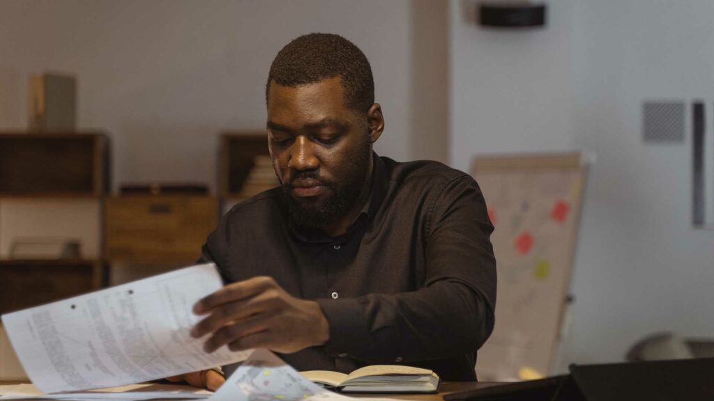 Man reading business documents