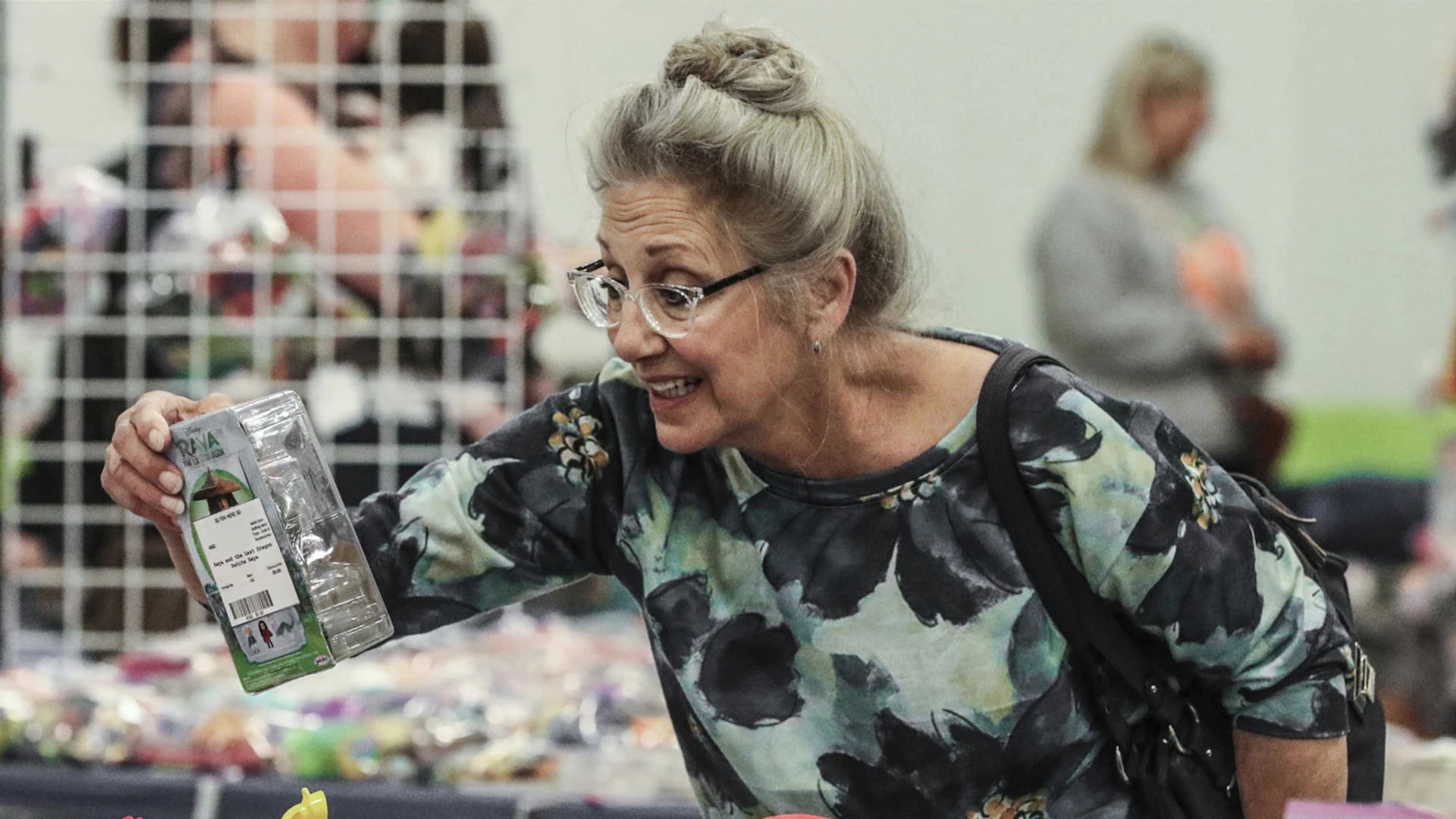 Cathy-Payne of Henderson looks at toys for her granddaughter at the Pigta-Consumer-confidence-in-US-falls-in-June | Brimco Cathy payne of henderson looks at toys for her granddaughter at the pigta