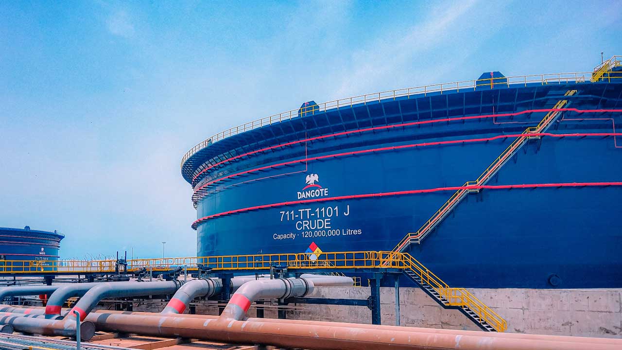 Dangote Refinery: Powering Africa’s Energy Future | Brimco Large blue crude oil tank labeled dangote with a capacity of 120 million litres at the dangote refinery in nigeria