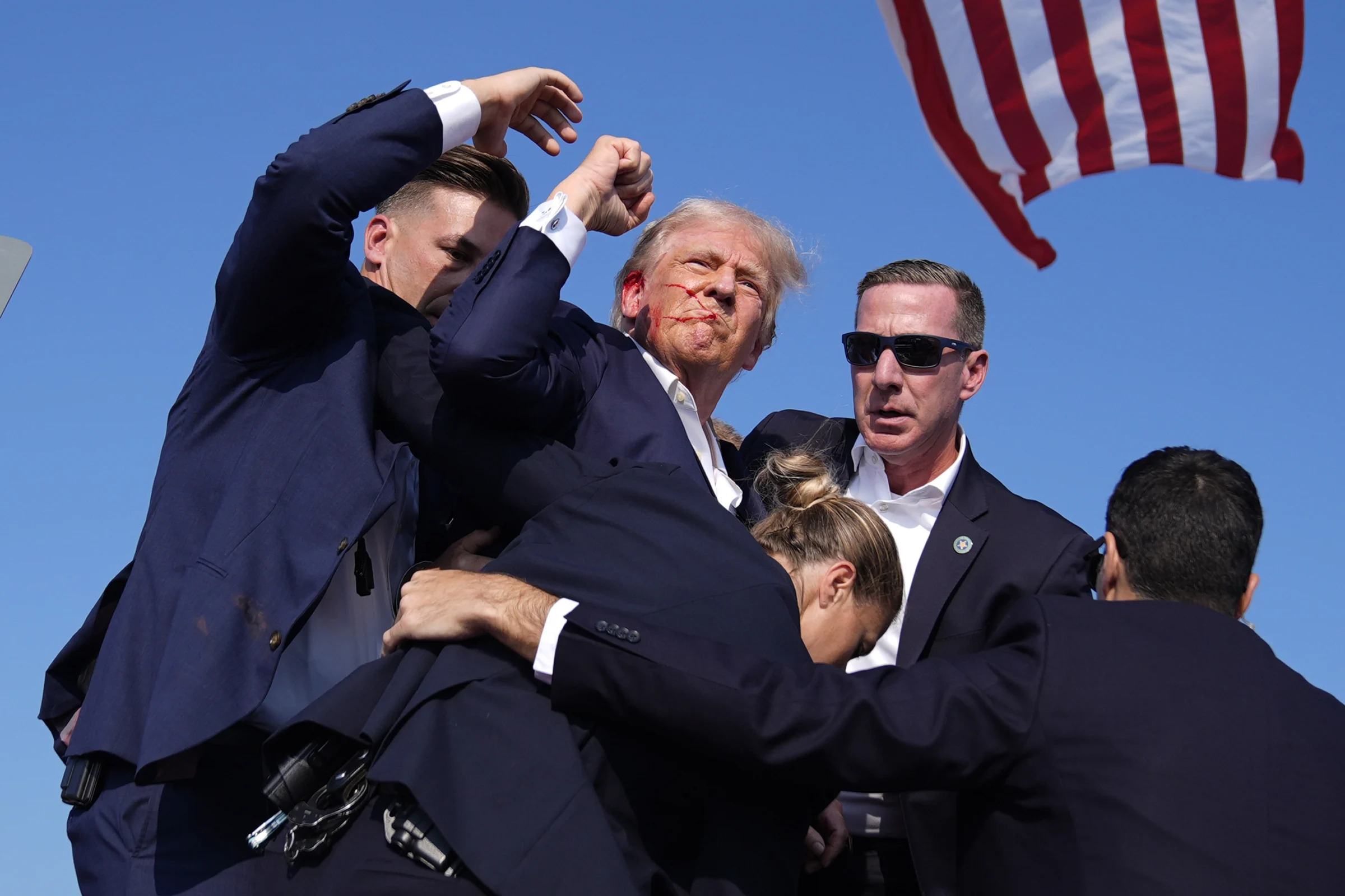 Republican presidential candidate former president donald trump is surround by u S Secret service agents at a campaign rally saturday july 13 2024 in butler pa ap photoevan vucci