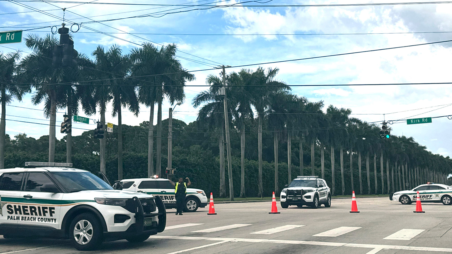 Police Activity on Palm Beach County Roads | Brimco Palm beach county sheriffs vehicles block a road intersection with orange cones and officers direct traffic at kirk road and summit blvd
