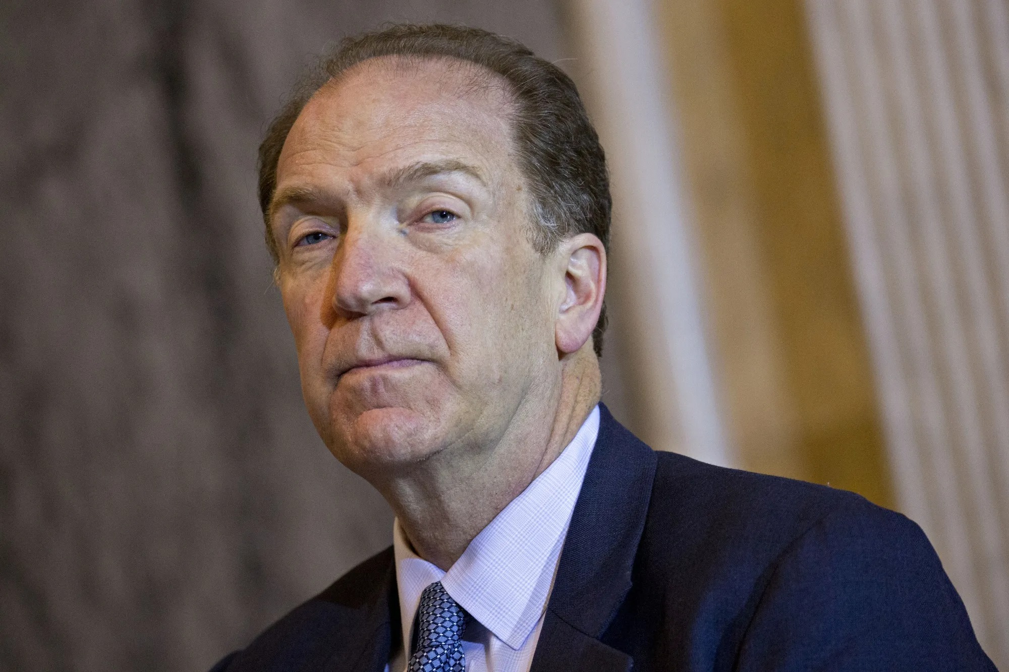 David Malpass – Leading Global Finance with Conservative Clarity | Brimco David malpass in a suit and tie looking serious during a formal international event