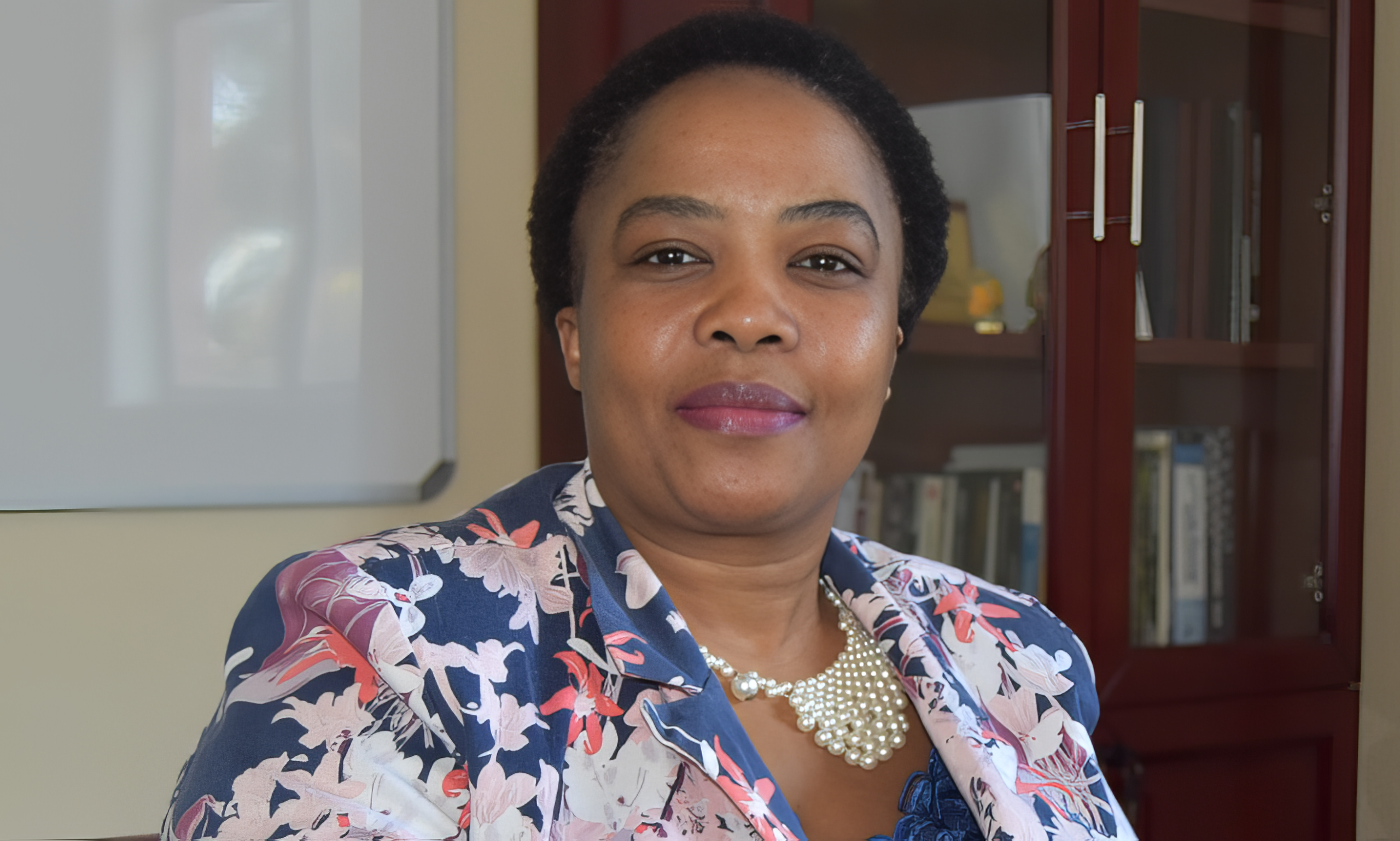 Professor Busisiwe Ncama Leading UKZNs Health Sciences into the Future | Brimco Professor busisiwe ncama deputy vice chancellor of ukzns college of health sciences in a floral blazer and pearl necklace