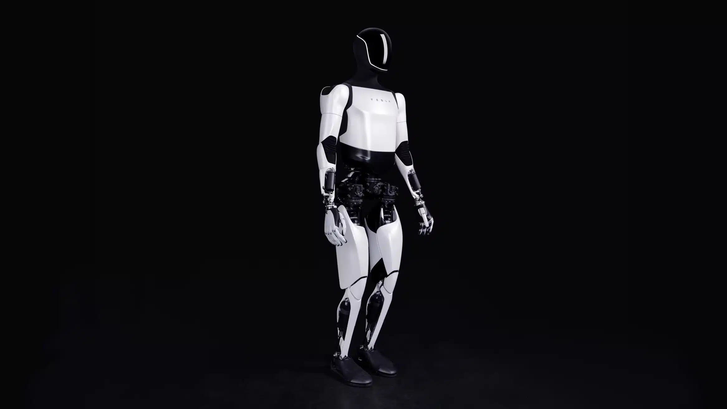 Tesla Optimus The Humanoid Revolution Begins | Brimco Tesla optimus humanoid robot standing upright on a black background