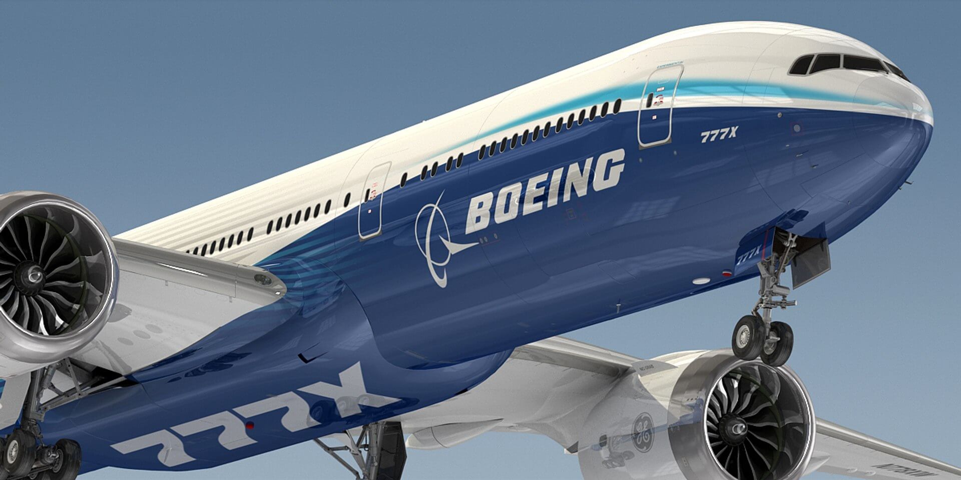 Close up view of the boeing 777x aircraft in blue and white livery featuring large engines and sleek aerodynamic design