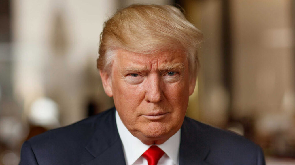 Donald J. Trump | Brimco Portrait of president donald trump wearing a navy suit white shirt and red tie facing the camera with a serious expression