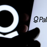 Palantir Technologies logo displayed on a smartphone screen, highlighting the company's focus on data-driven intelligence.