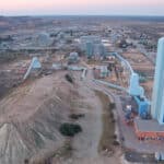 Aerial view of debswanas jwaneng diamond mine in botswana showcasing large scale mining infrastructure and processing facilities