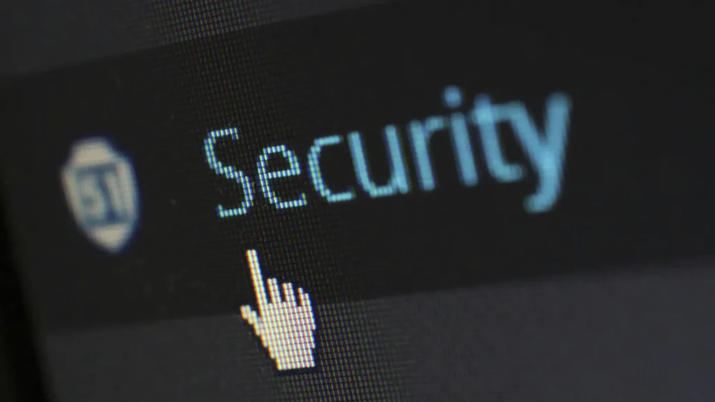 A computer screen with the word security highlighted and a cursor pointing at it symbolizing cybersecurity awareness