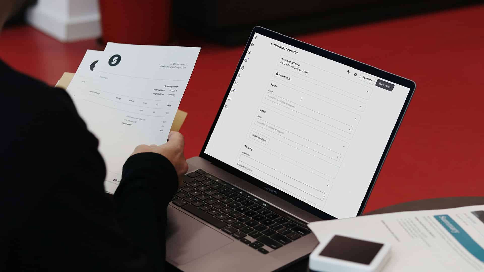 Person viewing digital invoice on laptop