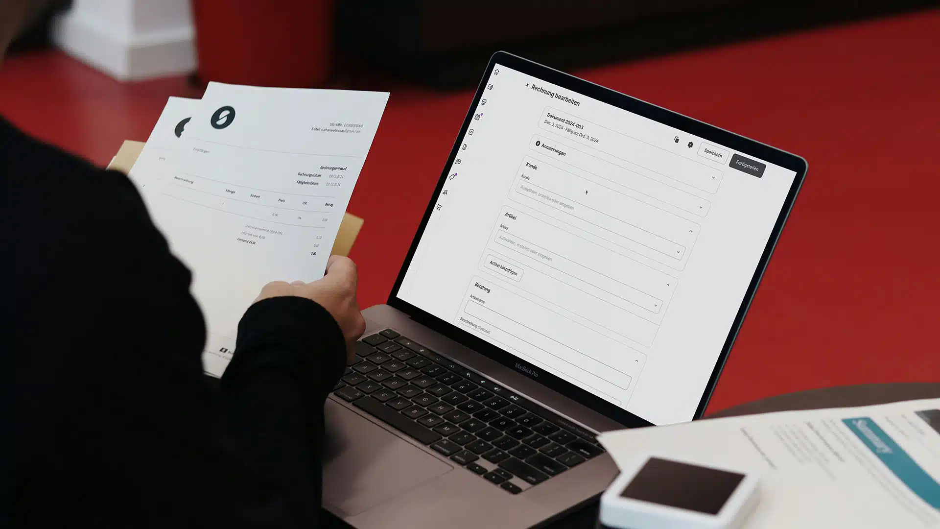 Person viewing digital invoice on laptop