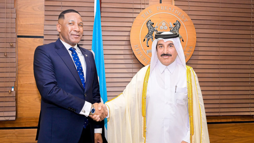 President duma boko and sheikh mansour al thani shaking hands after signing the $12 billion botswana qatar investment deal