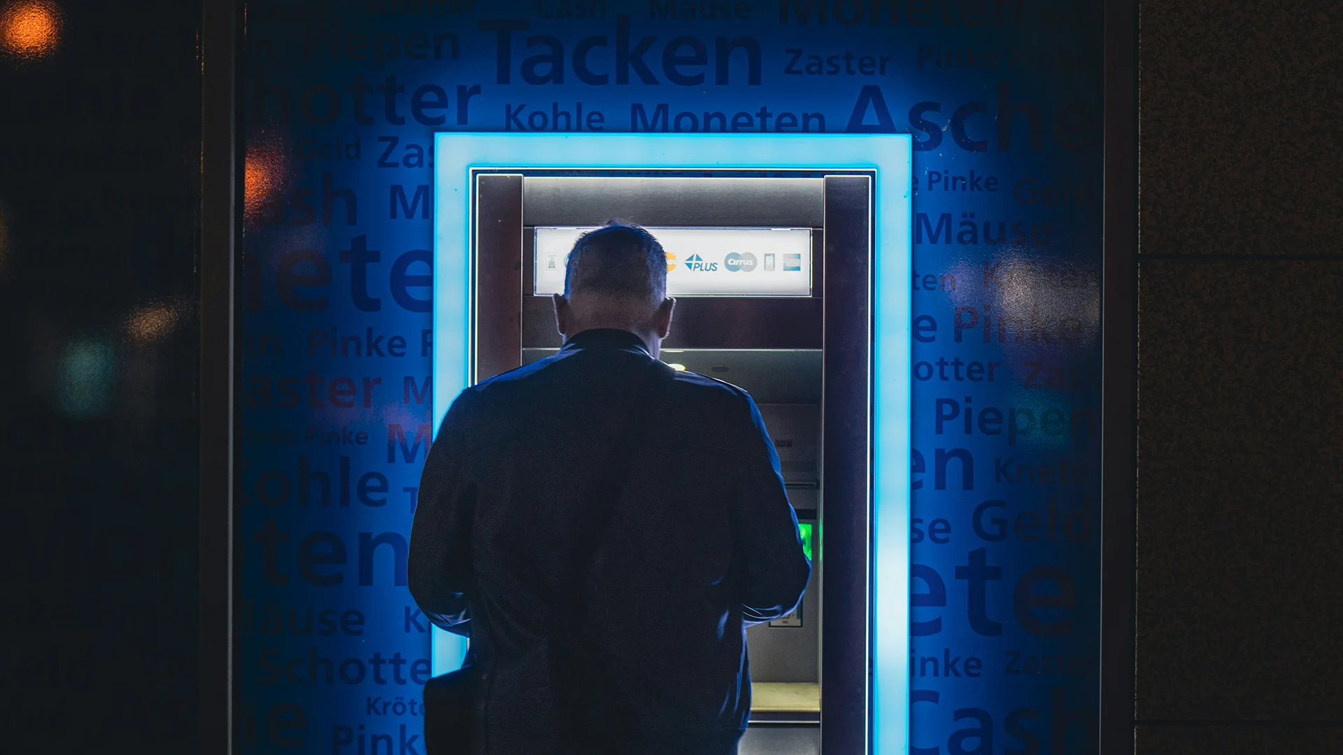 Safe Banking with ATM Access | Brimco Man using atm at night with glowing blue light