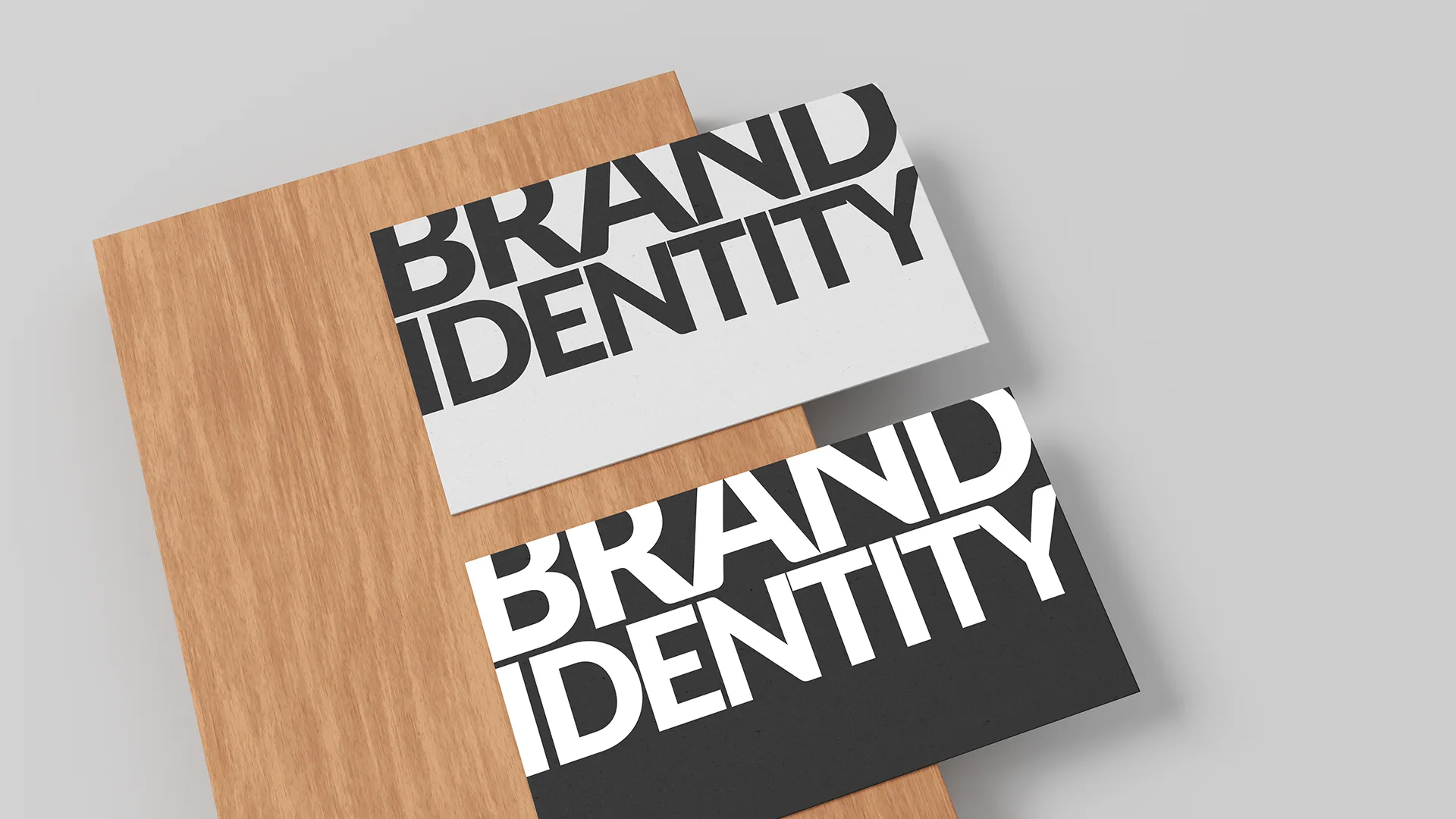 Brand identity design cards on wooden background