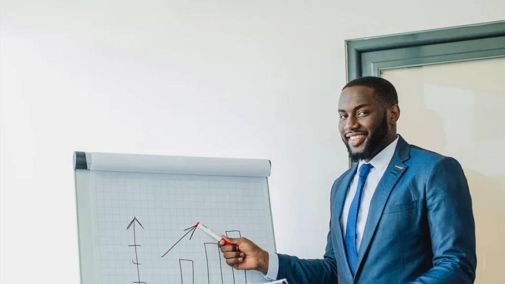 Business professional presenting a business growth plan with charts and analysis