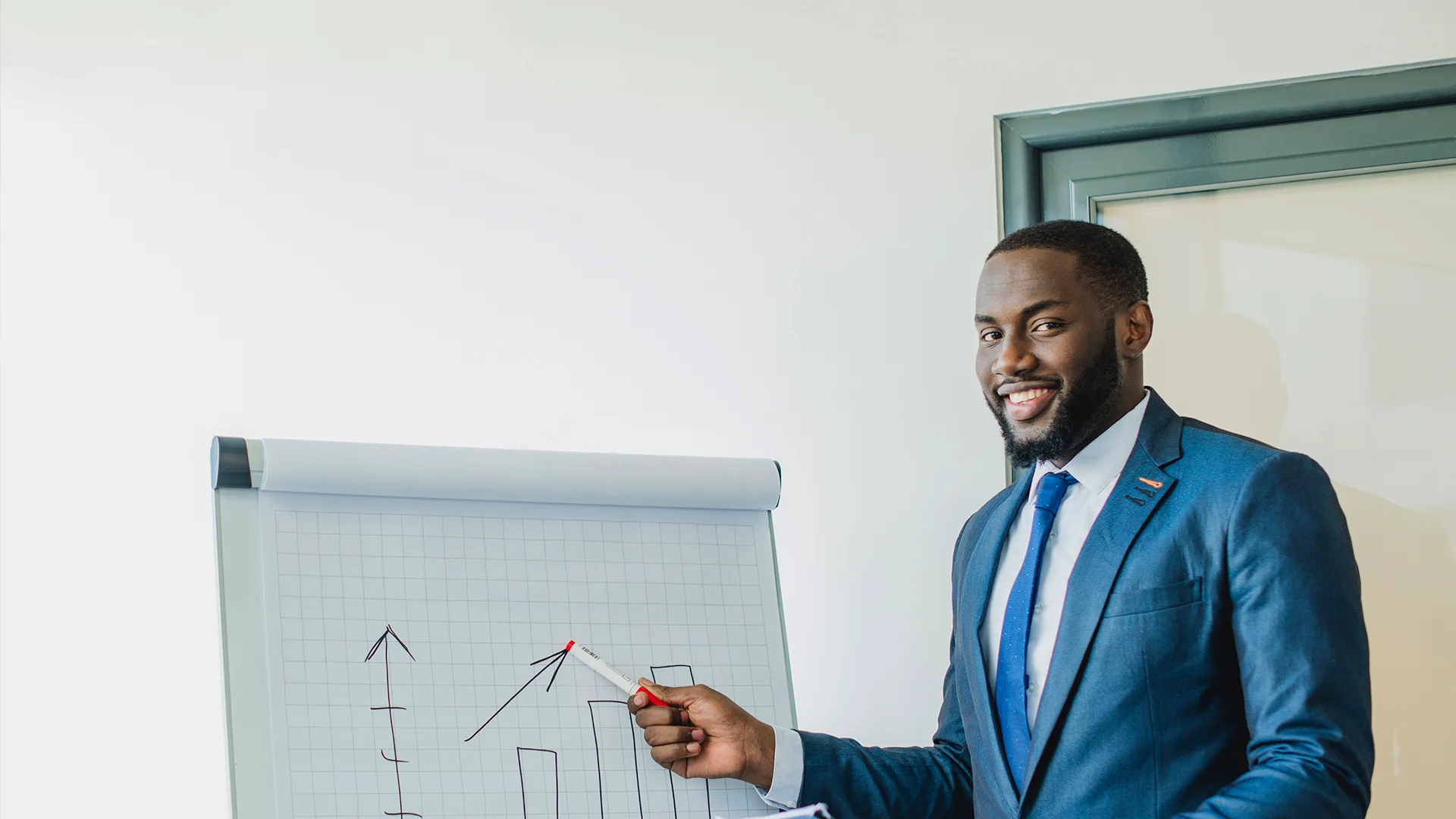 Business Growth Plan Strategy Presentation | Brimco Business professional presenting a business growth plan with charts and analysis