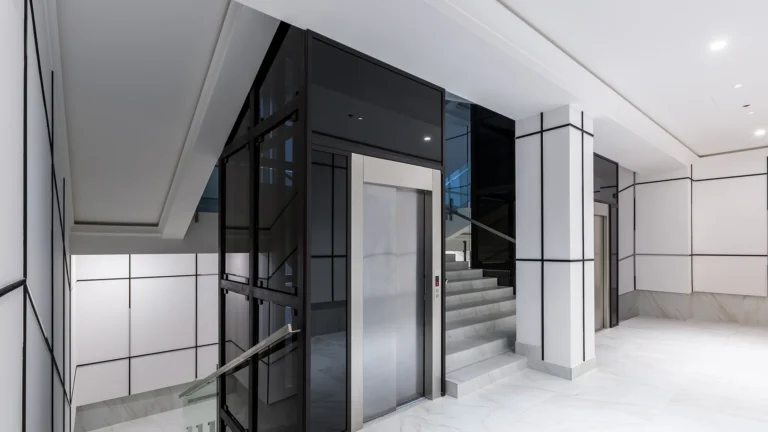 Modern commercial elevator in sleek office building interior, enhancing accessibility and efficiency.