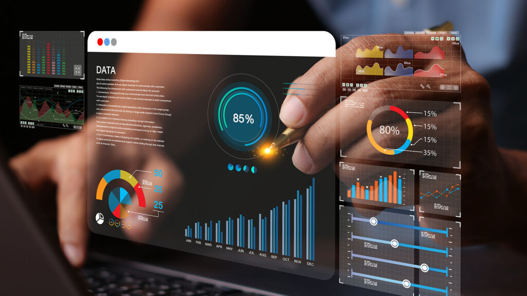 Hand analyzing interactive business analytics dashboard with KPI charts and graphs.