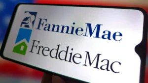 Fannie mae and freddie mac logos shown on a smartphone screen symbolizing the u S Housing finance institutions and mortgage market system