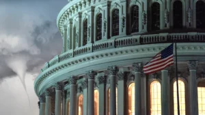 The u S Capitol at night with glowing windows and a tornado forming in the background sky