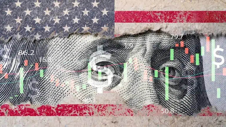 A torn american flag overlay reveals benjamin franklins eyes from a u S Dollar bill with stock market candlestick charts superimposed
