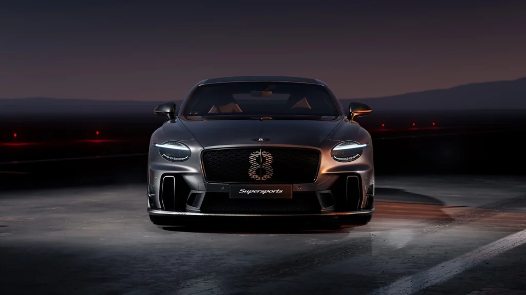 Midnight Precision A Modern Supersports Statement | Brimco Front facing view of a luxury supersports coupe parked on a runway at dusk with led headlights illuminated a sculpted grille and dramatic low light reflections emphasizing speed and design