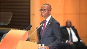 Vice-President and Finance Minister of Botswana speaking at a podium during the 2026/2027 National Budget Speech in Parliament.